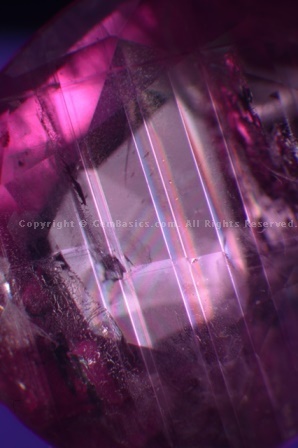 Polysynthetic twinning in magmatic corundum